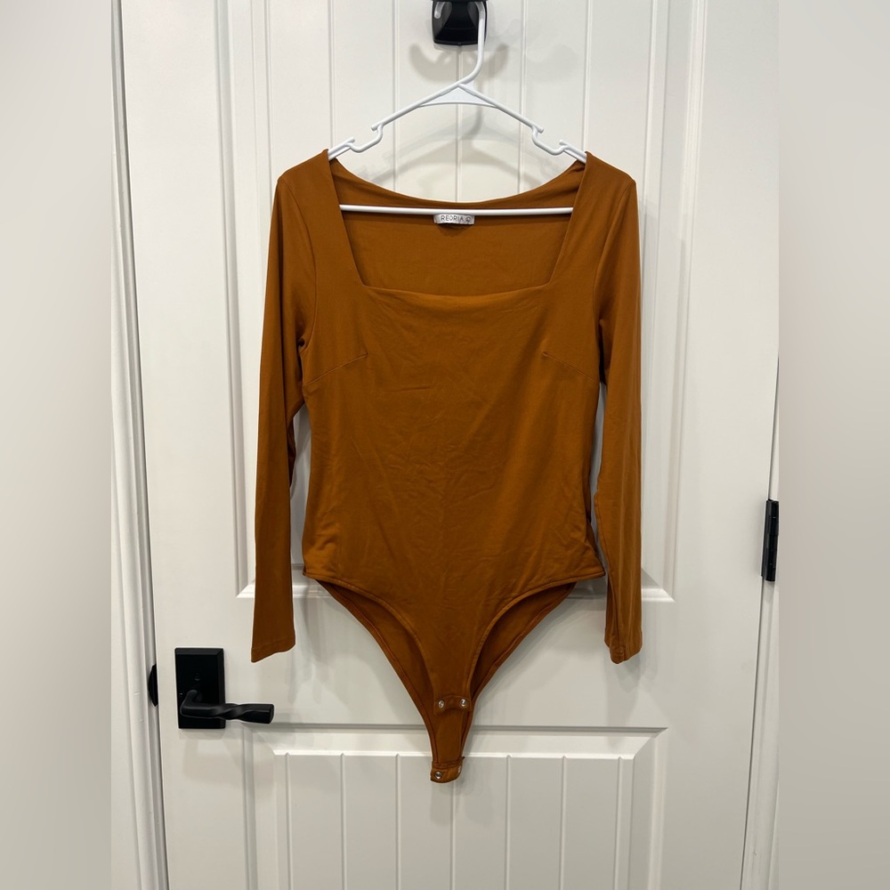 Reoria burnt orange Long Sleeve bodysuit